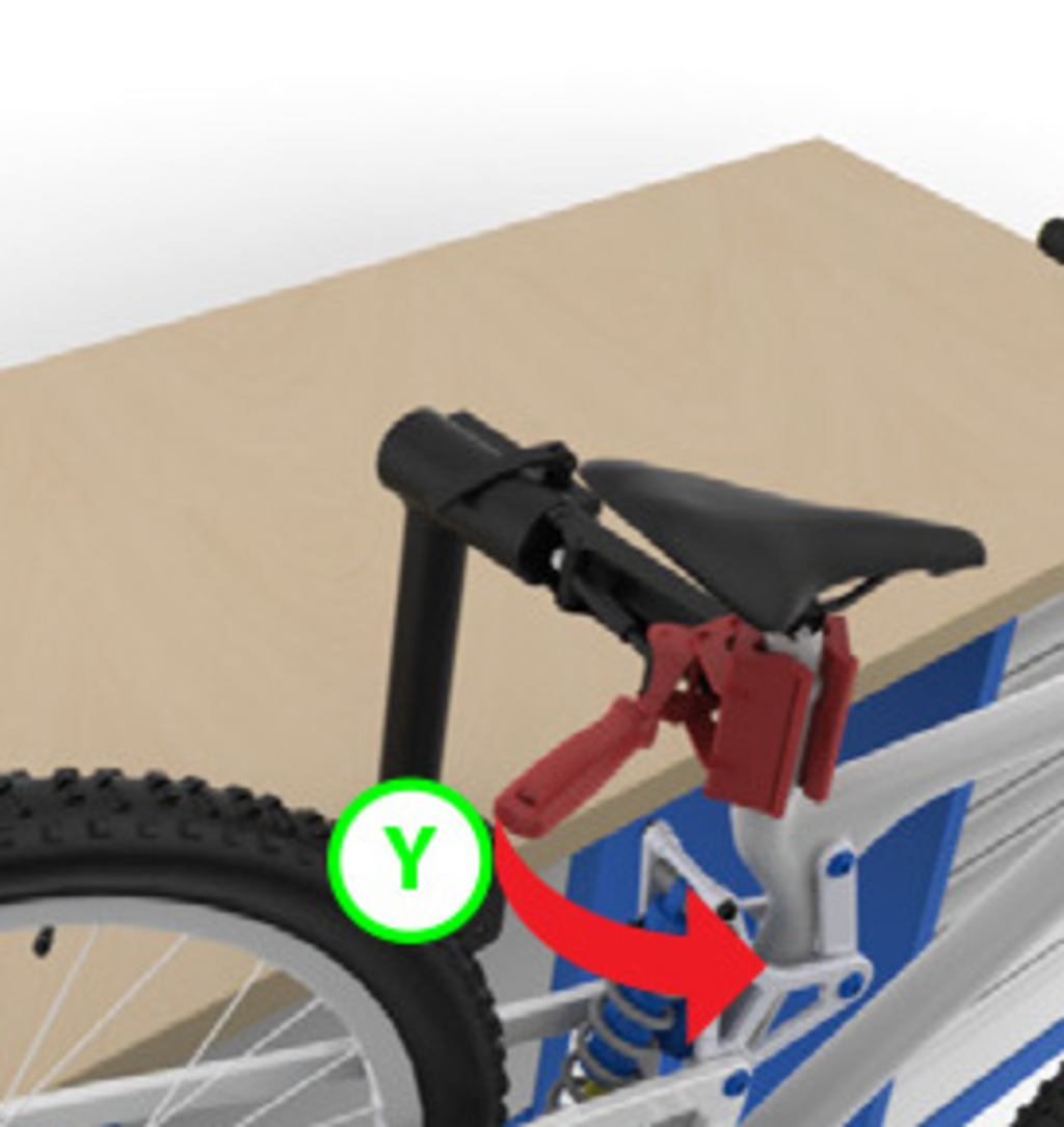 Release bike from stand? To release, firmly hold bike frame. Flip handle (Y) to quickly release tube from the jaw.